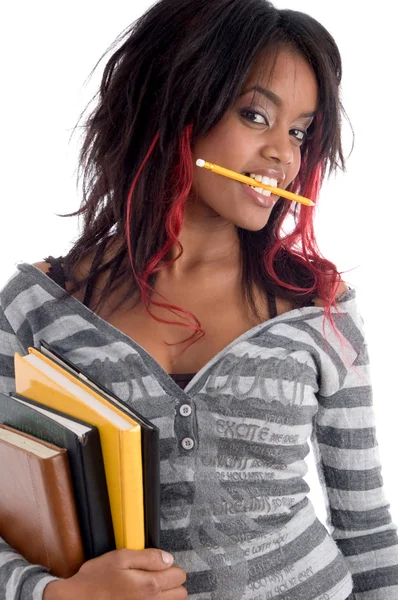 Adolescente estudiante sosteniendo sus libros de estudio — Foto de Stock