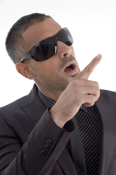 Handsome male pointing with finger — Stock Photo, Image