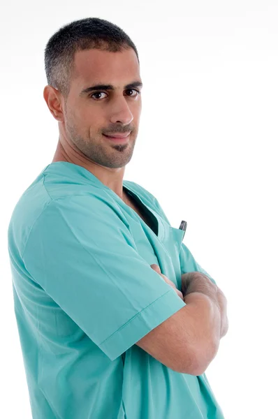 Kirurg med knäppta händer, sidovy — Stockfoto