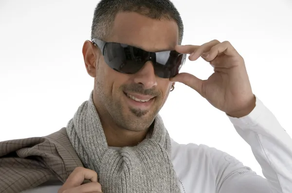 Bonito masculino segurando óculos — Fotografia de Stock