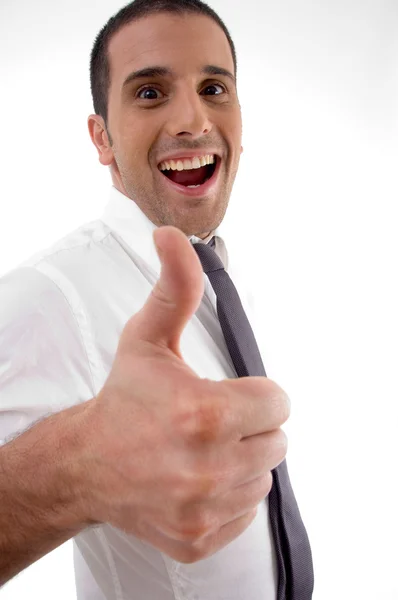 Young cheerful executive with thumbs up — Stock Photo, Image