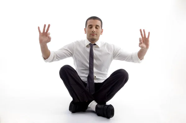 Professional man doing yoga — Stock Photo, Image