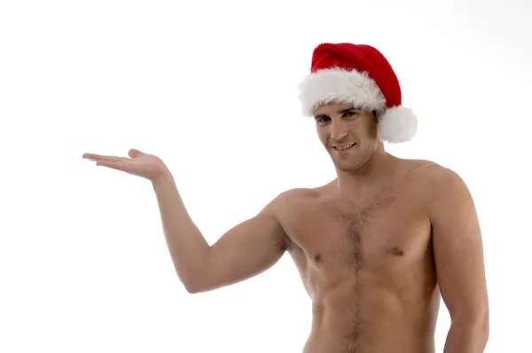 Young guy posing in christmas hat — Stock Photo, Image