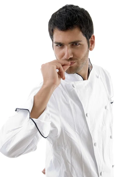 Jovem chef posando com as mãos na boca — Fotografia de Stock