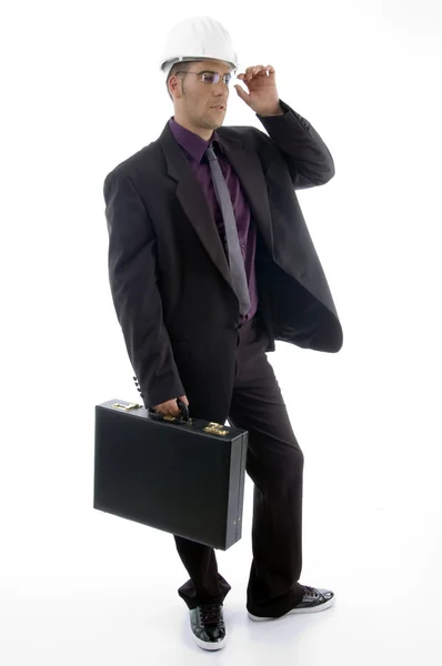 Architekt w kask trzyma worek biuro — Zdjęcie stockowe