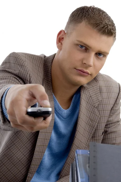 Jeune homme avec télécommande — Photo