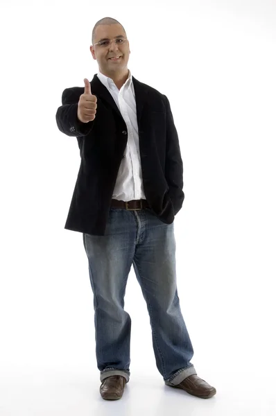 Empresário sorridente com os polegares para cima — Fotografia de Stock