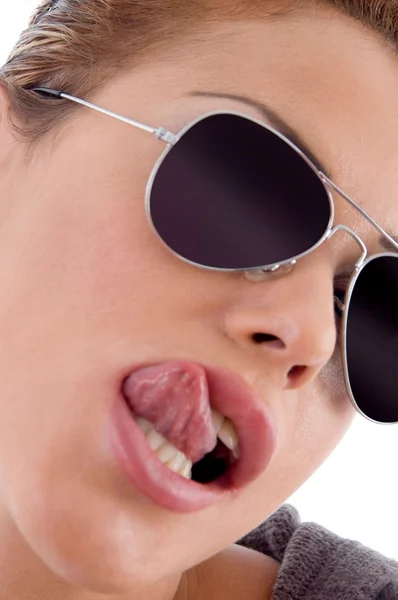 Beautiful woman licking her lips — Stock Photo, Image