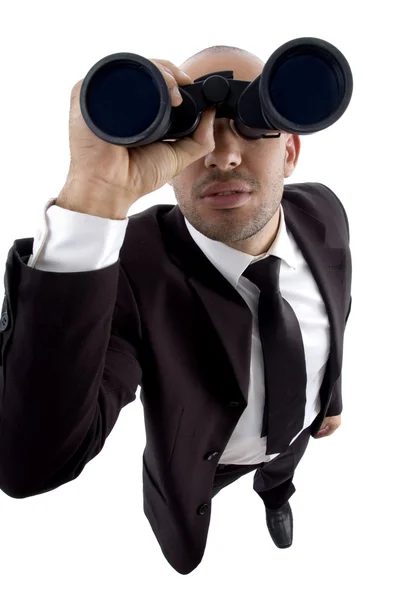 Young lawyer looking through binoculars — Stock Photo, Image