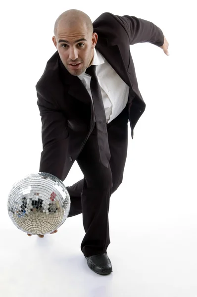Joven ejecutivo tumbling disco ball — Foto de Stock