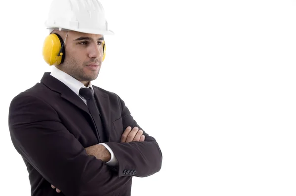 Engineer wearing earplug, folded arms — Stok fotoğraf