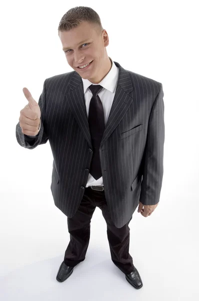 Hombre de negocios sonriente con pulgares arriba —  Fotos de Stock