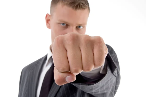 Businessman showing punch to camera — Stock Photo, Image