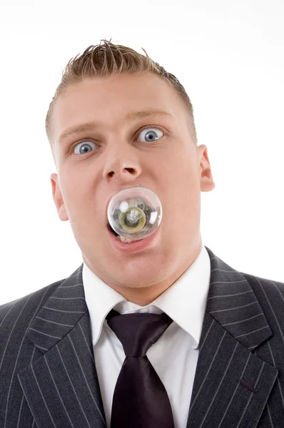 Caucasian holding electric bulb in mouth — Stock Photo, Image