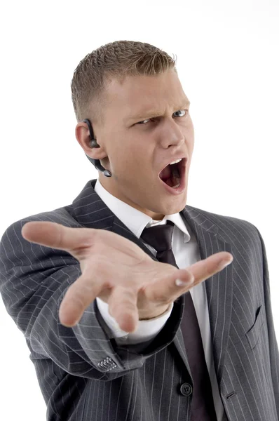 Rozhněvaný mladý obchodní muž křičí — Stock fotografie