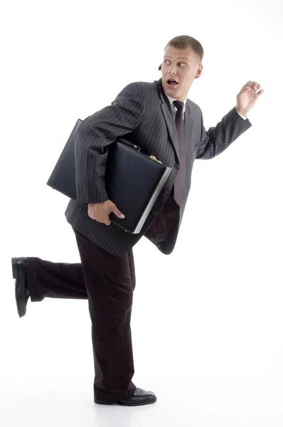 Podnikatel ve spěchu drží aktovku — Stock fotografie