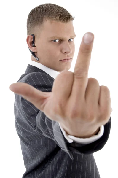 Businessman showing vulgar hand gesture — Stock Photo, Image