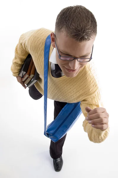 Männlicher Teenager Student mit seiner Tasche — Stockfoto
