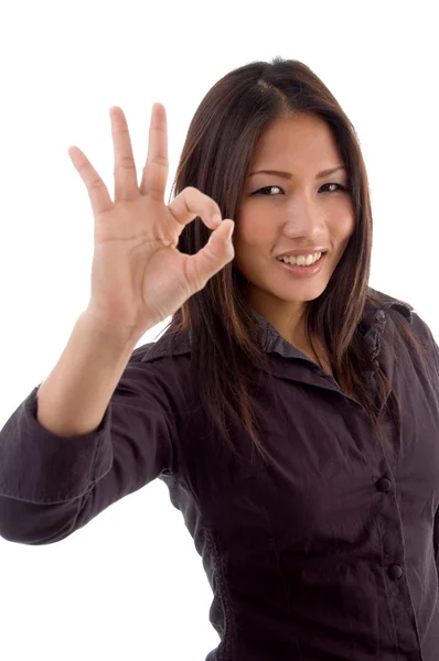 Genç kadın gösteren ok işareti — Stok fotoğraf