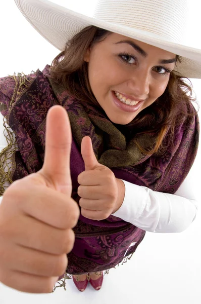 Nádherná mladá žena ukazuje palec — Stock fotografie