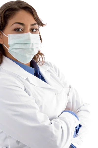 Médico femenino con máscara facial — Foto de Stock