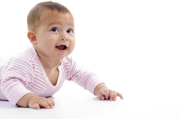 Porträt des spielenden süßen Babys, das nach oben schaut — Stockfoto