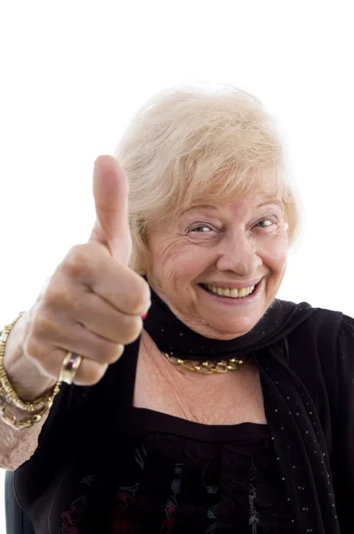 Mutlu yaşlı kadın başparmak gösterilen — Stok fotoğraf