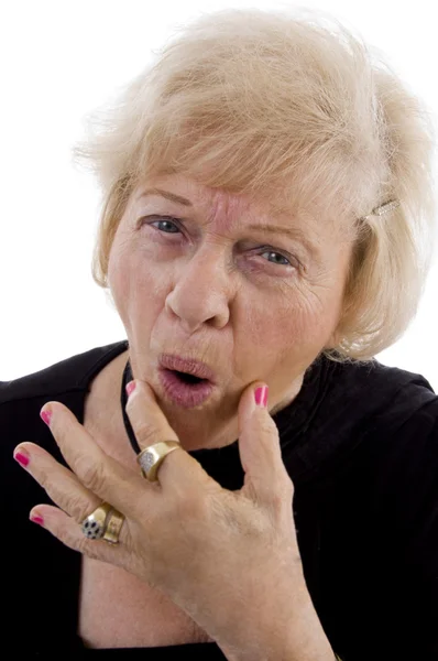 Portrait of old woman making faces — Stock Photo, Image