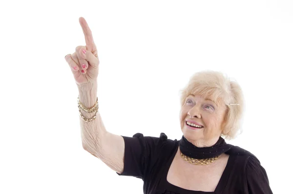 Old female pointing upwards — Stock Photo, Image