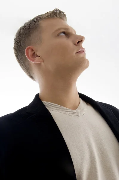 Portrait of male wearing looking upwards — Stock Photo, Image