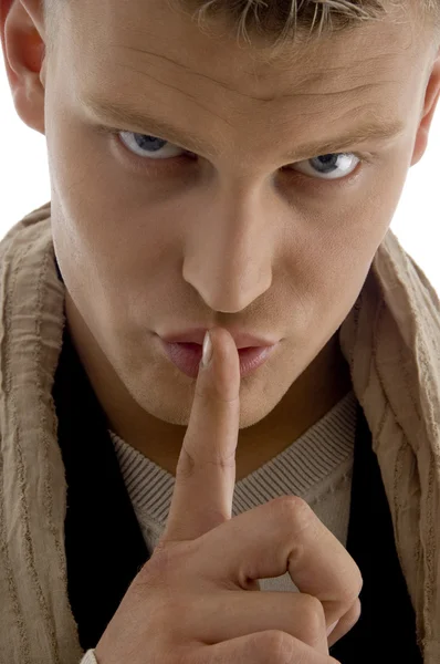 Young man asking to keep silent — Stock Photo, Image