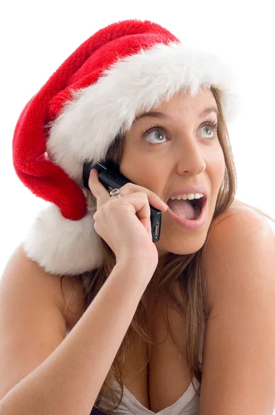 Christmas girl talking on cell phone — Stock Photo, Image