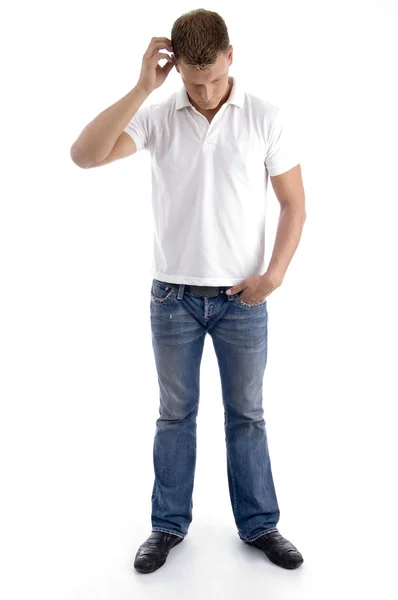 Confused man itching his head Stock Photo