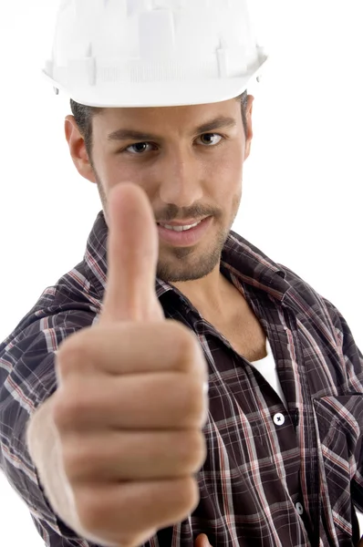 Portrait of young guy gesturing thumbsup Stock Picture