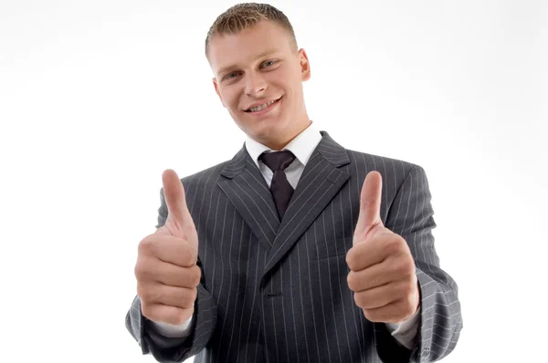 快乐行政与竖起大拇指微笑 免版税图库照片