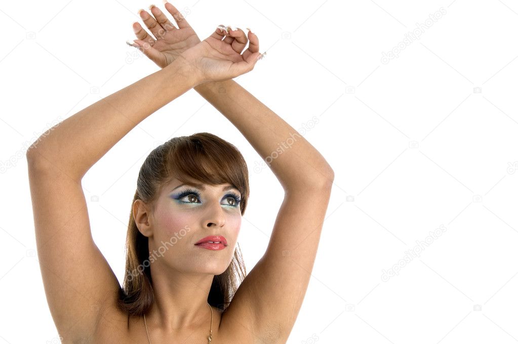Fashionable female with raised arms