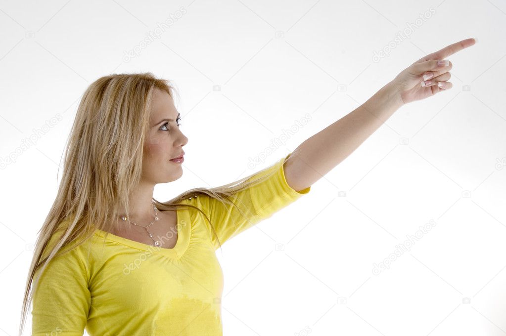 Beautiful woman pointing sideways