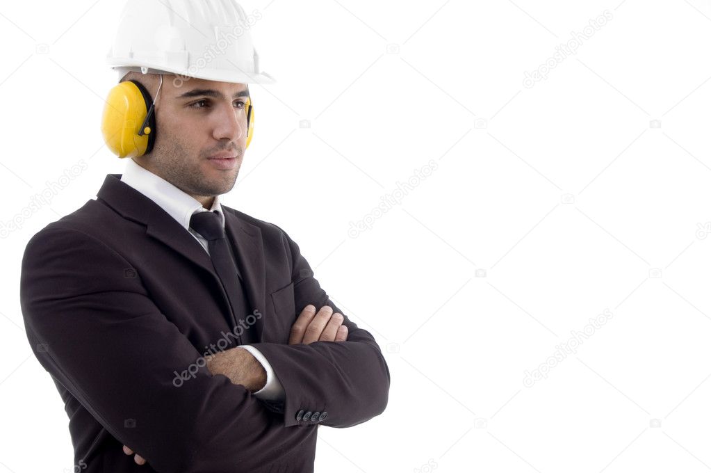 Engineer wearing earplug, folded arms