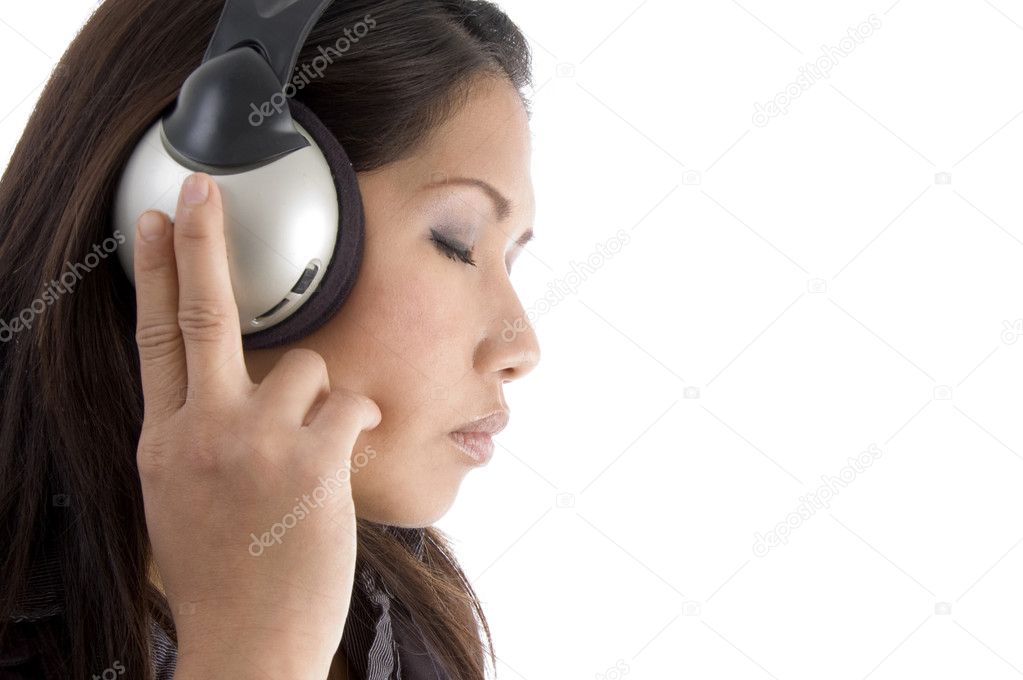 Young woman tuned in music