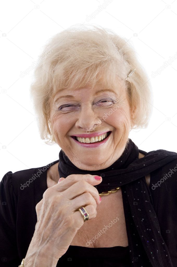 Portrait of old woman looking at camera