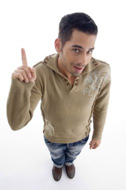 Young guy pointing upwards, ariel view clipart