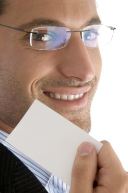 Close up of businessman with his card clipart