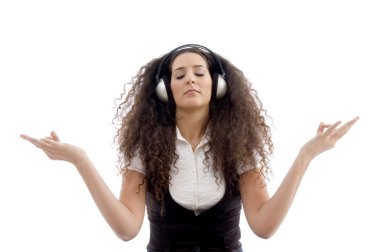 Latin young female meditating in music clipart