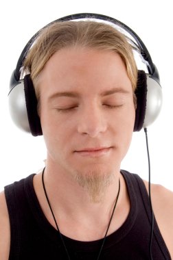 Handsome man tuned into music clipart