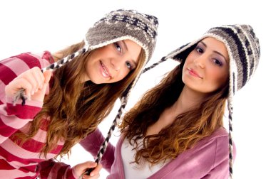 Pretty girls dressed in winter outfit clipart