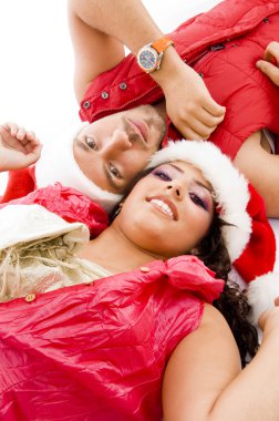 Christmas couple lying on floor clipart