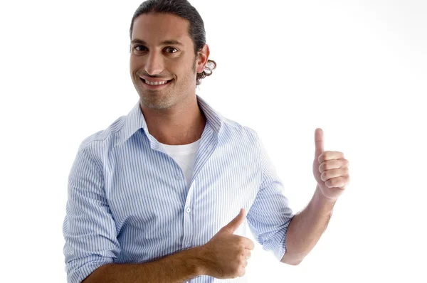 Smiling male model with thumbs up — Stock Photo, Image