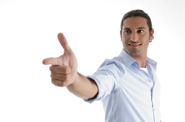 Young handsome guy pointing — Stock Photo, Image