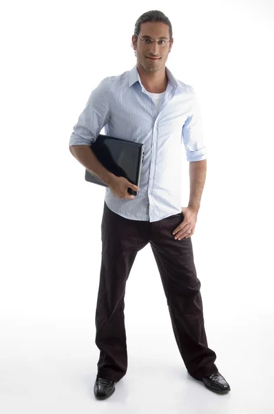 Jovem executivo americano segurando laptop — Fotografia de Stock