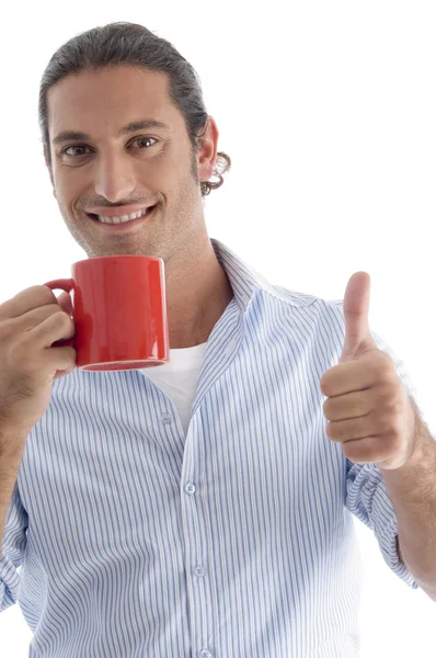 Man enjoying coffee and gesturing luck — Stock Photo, Image